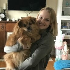 Hannah Menary holding a dog