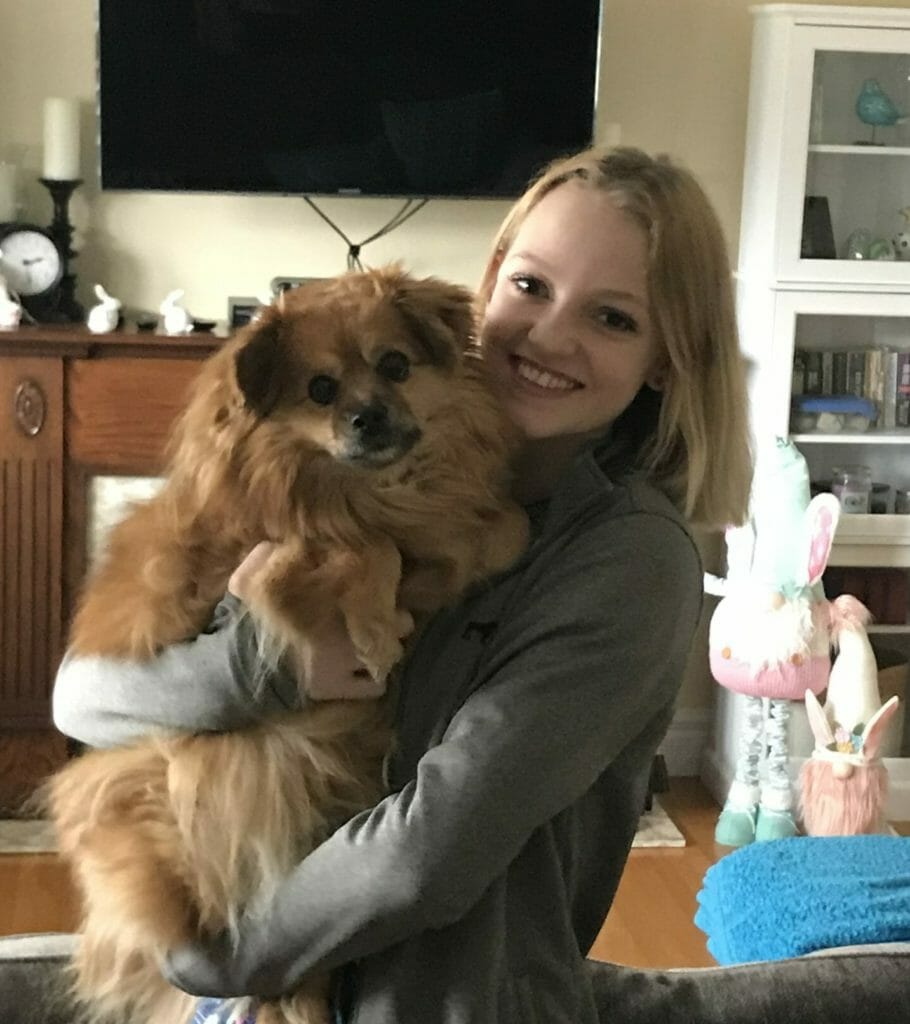 Hannah Menary holding a dog